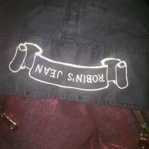 Red shiny Robin brand jeans